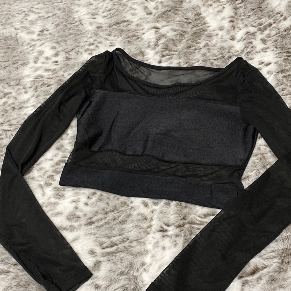 Sheer midriff top.